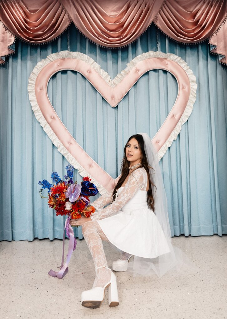 Bride posing for photos at Sure Thing Too in Las Vegas.