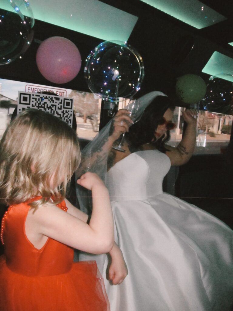 Bride captured on film on a party bus