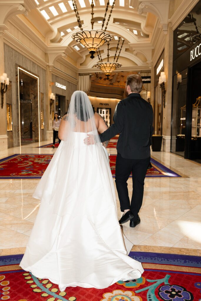 Bride and groom portraits at The Wynn Shops during their Vegas elopement