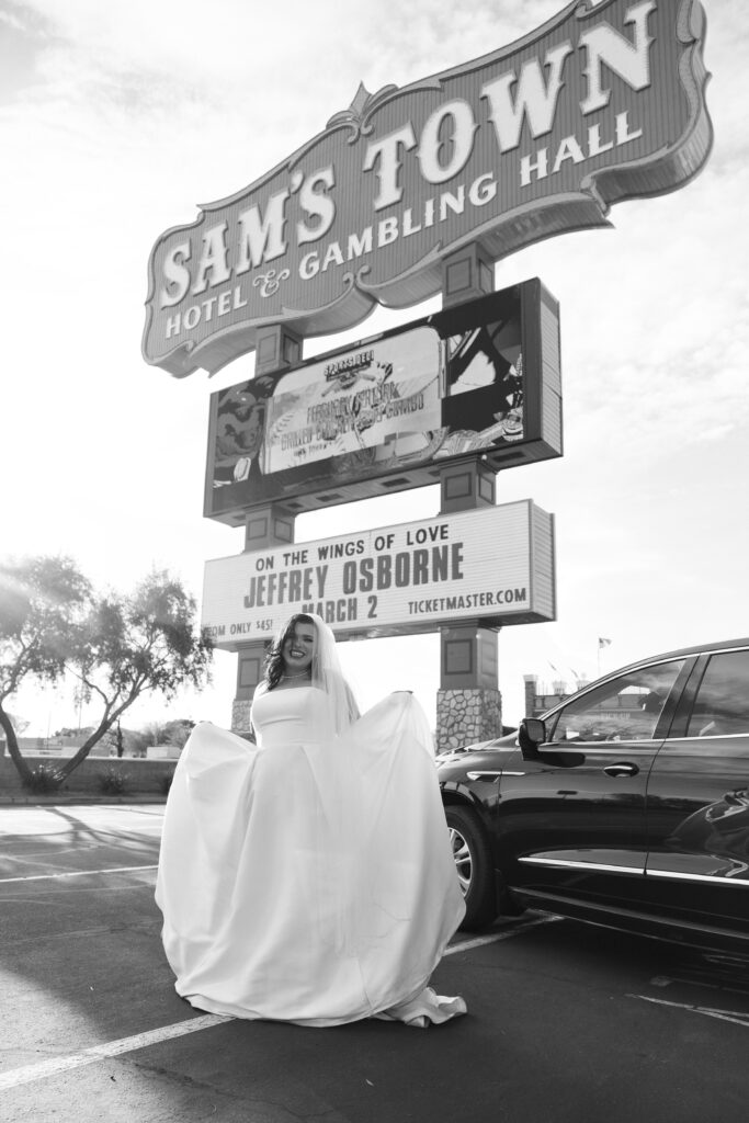 Bride posing for photos in front of Sam Town Hotel and Gambling Hall 