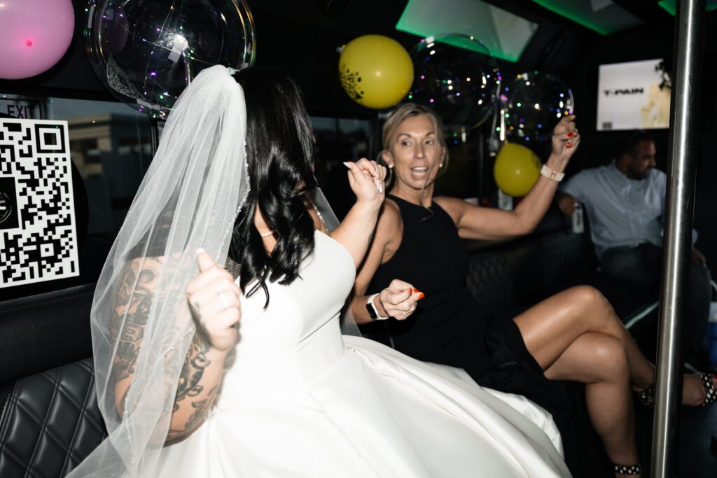 Bride dancing on a party bus