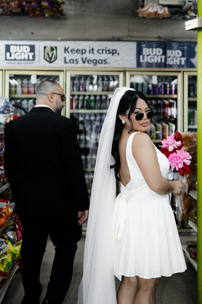 Bride and groom inside a Las Vegas convenience store 