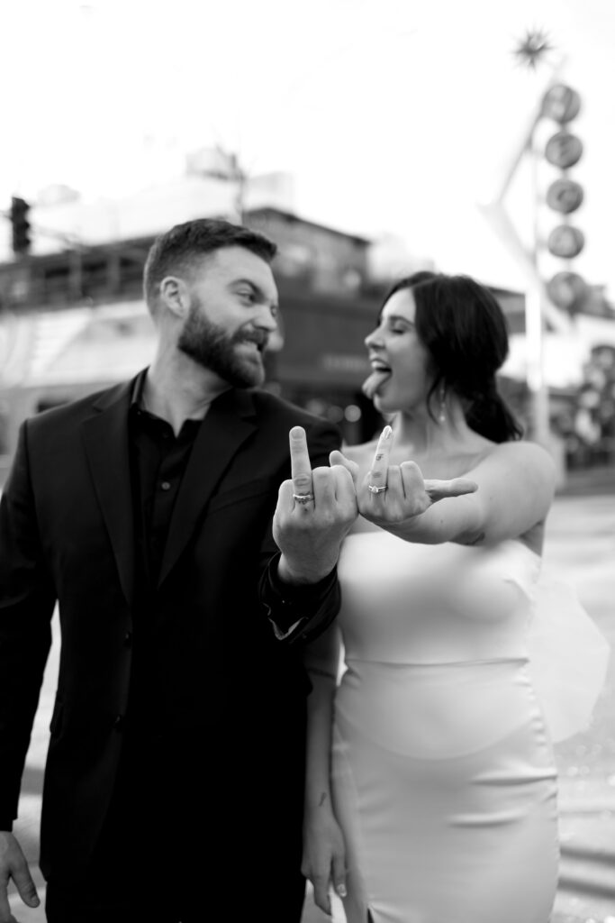 Bride and grooms portraits down Fremont Street in Vegas