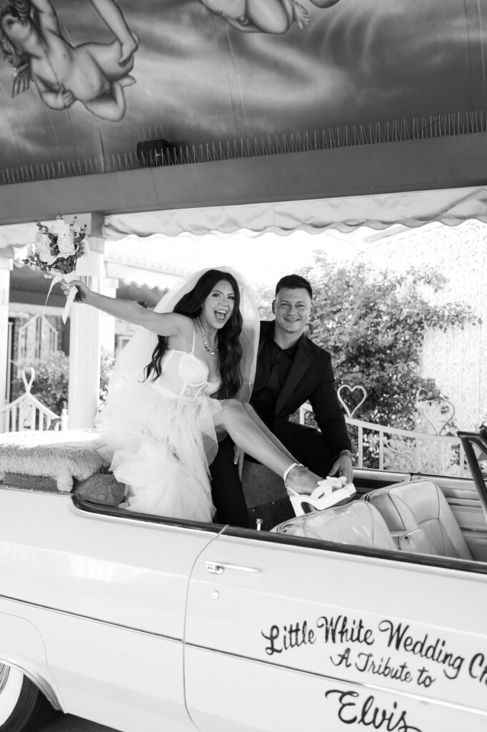 Bride and groom portraits after getting eloped in Las Vegas at The Little White Chapel during their Pink Cadillac Ceremony