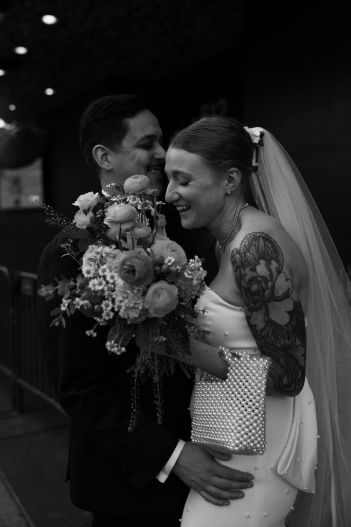 Black and white portraits of a bride and groom during their Las Vegas elopement wedding