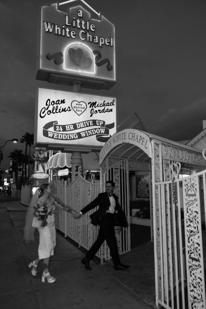 Black and white bride and groom portraits outside of The Little White Chapel