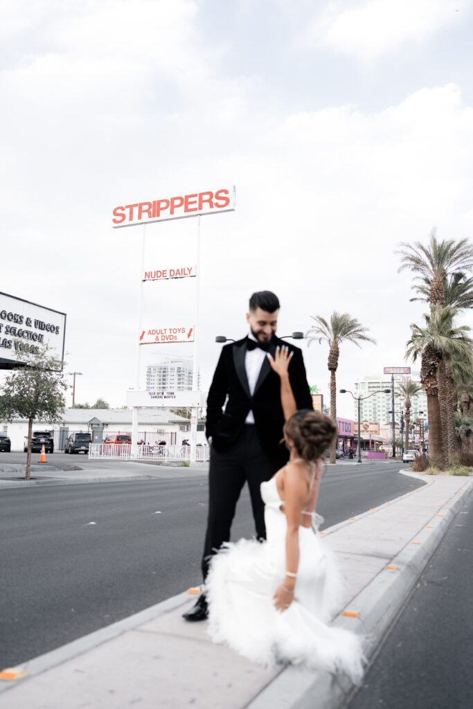 Bride and groom portraits outside of The Little White Chapel in Vegas