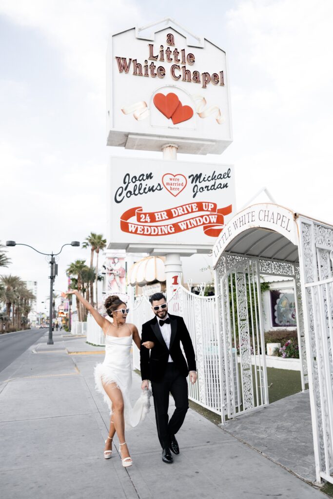 Bride and groom portraits outside of The Little White Chapel in Vegas
