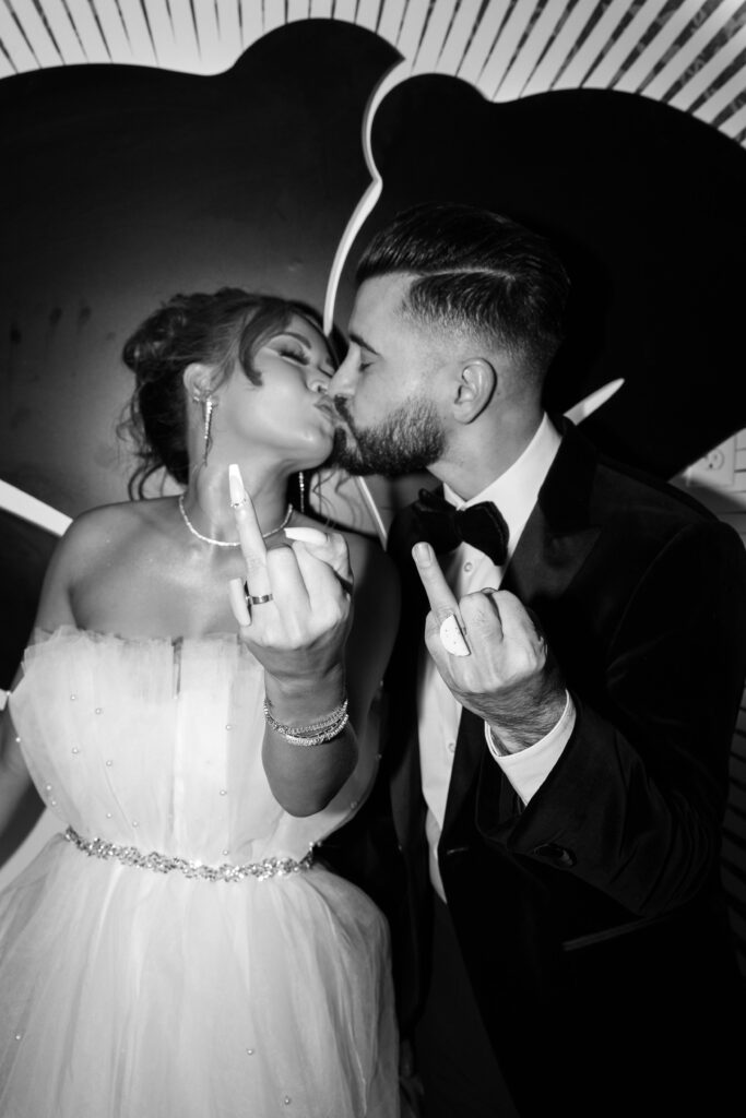 Black and white bride and groom flash portraits during their Taco Bell Las Vegas wedding