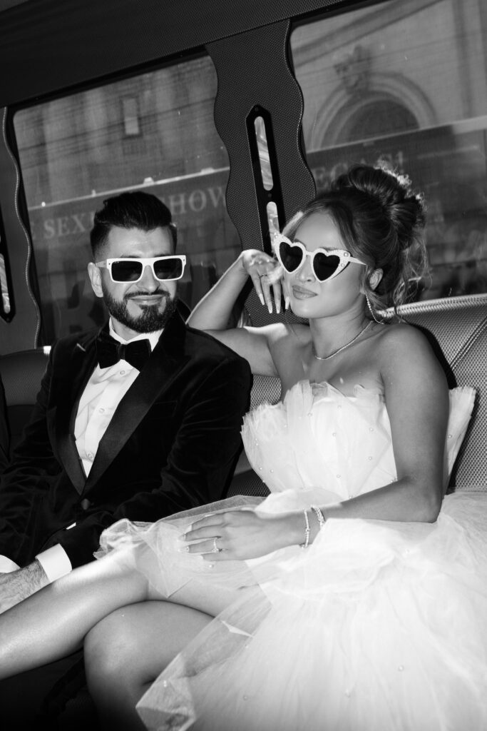 Bride and groom on the party bus on their way to their Las Vegas Taco Bell wedding