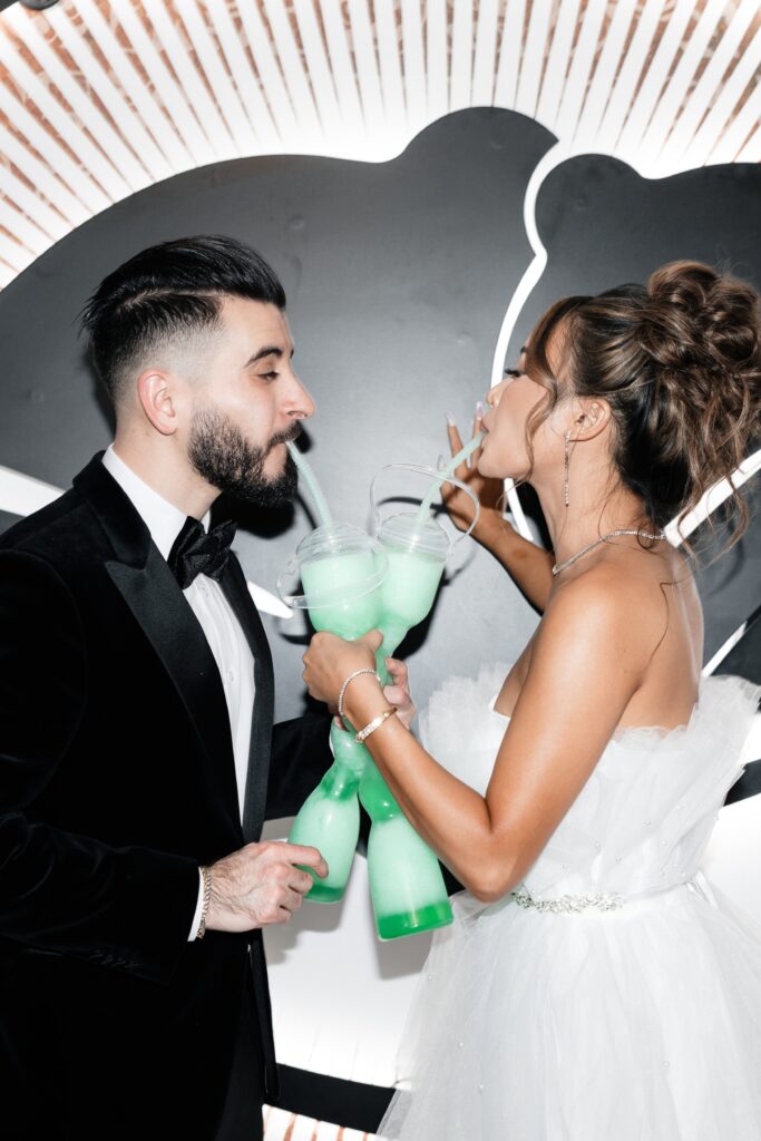Bride and groom drinking Baja Blast during their Taco Bell Las Vegas wedding
