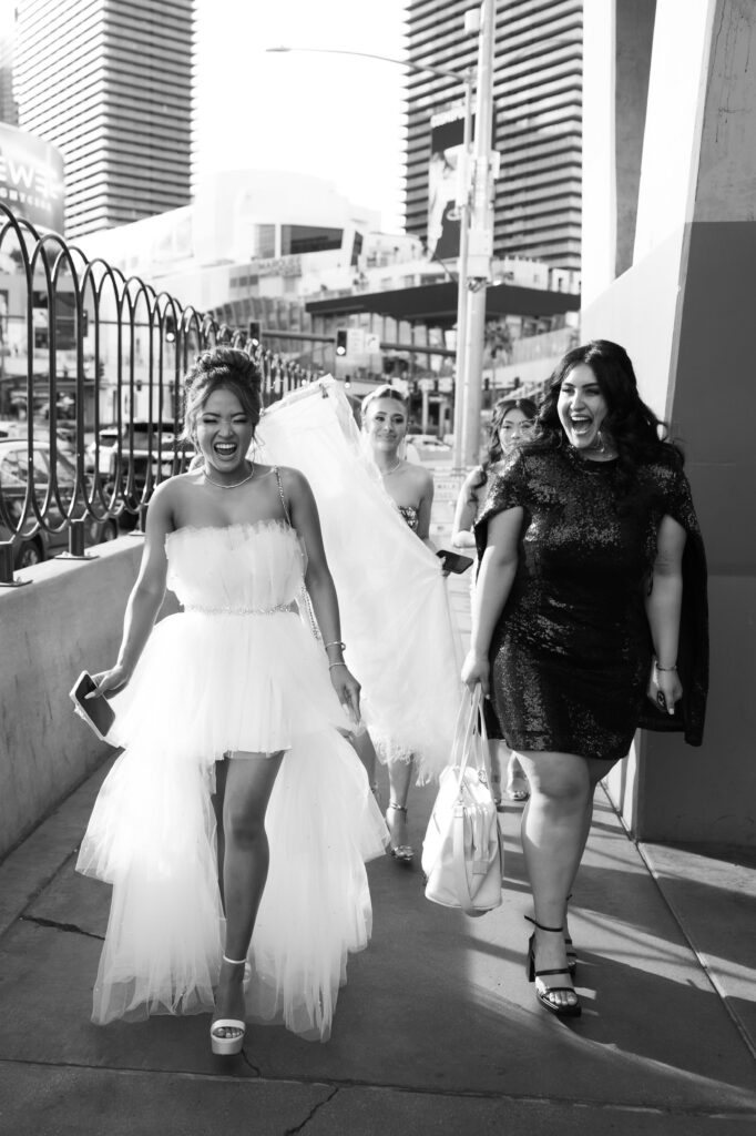 Bride and guests walking to the party bus