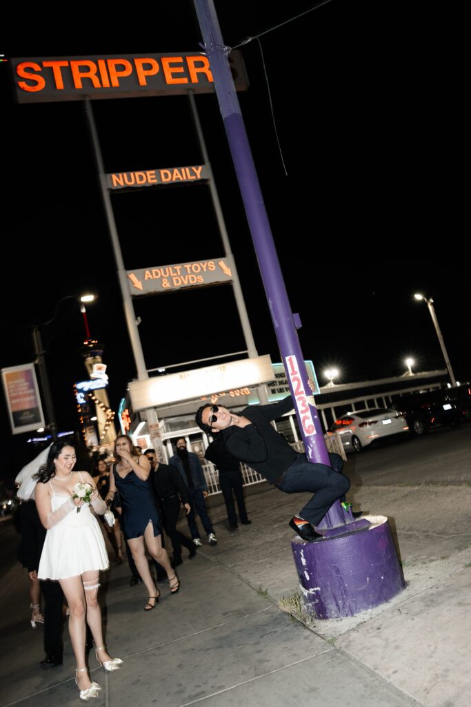 Bride, groom and their wedding party having fun in downtown Las Vegas