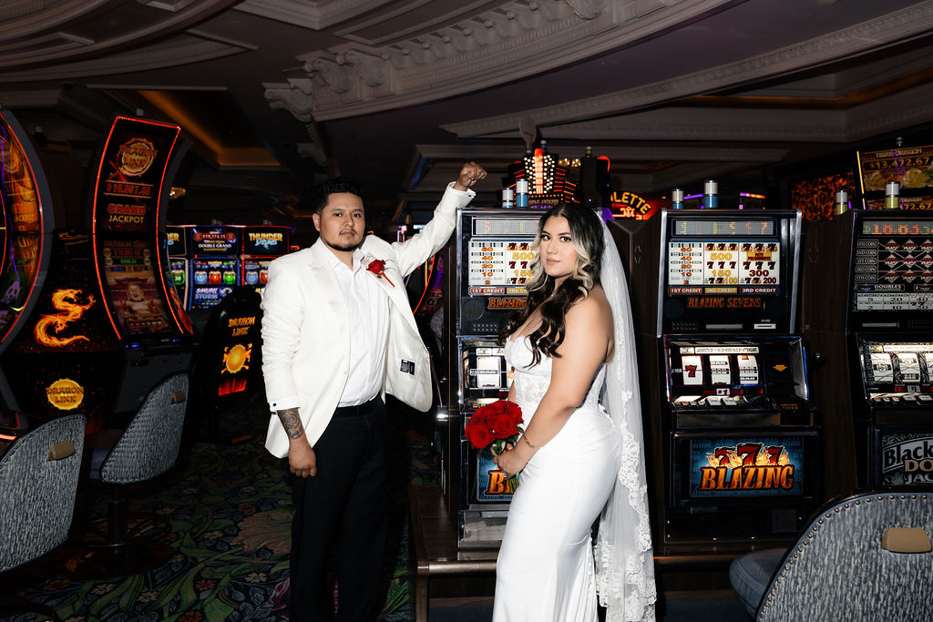 Bride and grooms flash elopement portraits by the casino slots in Las Vegas