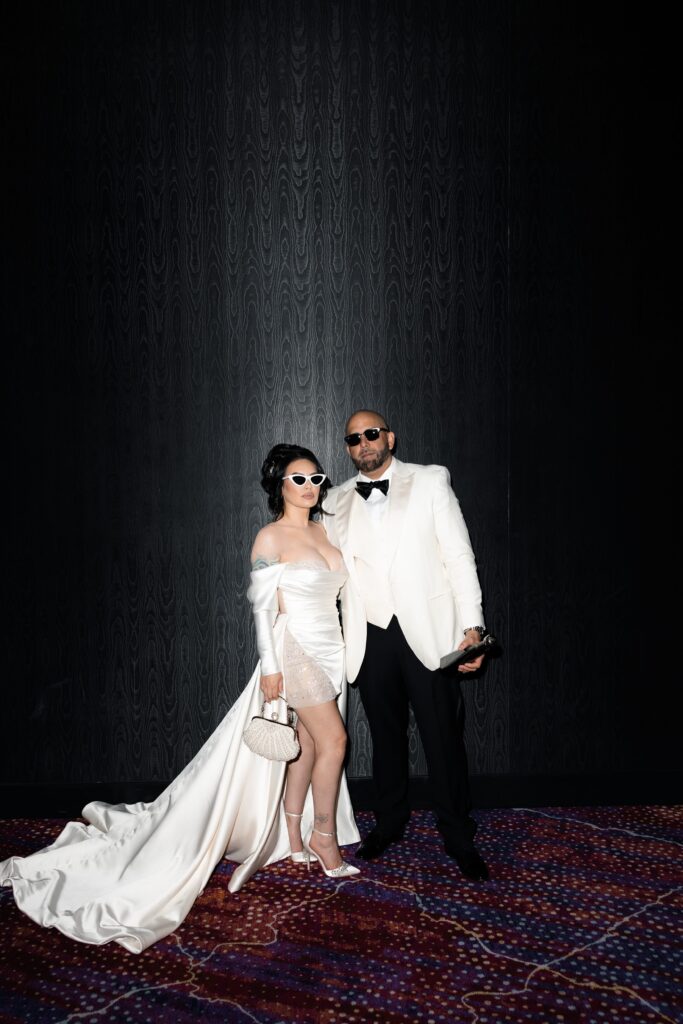 Bride and groom posing for their flash editorial elopement photos at Virgin Hotel in Las Vegas 