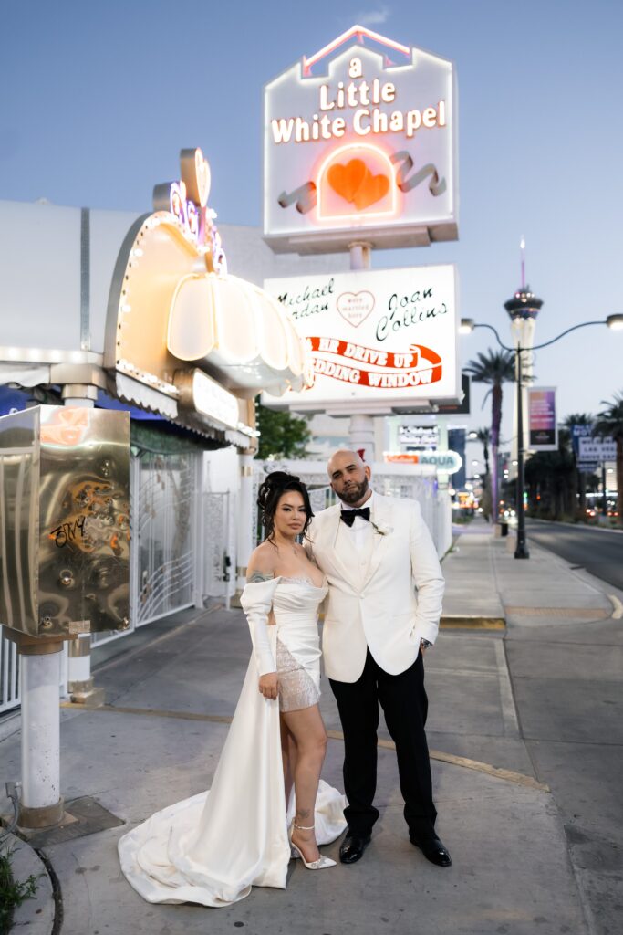 Bride and grooms Las Vegas elopement photos at The Little White Chapel at dawn