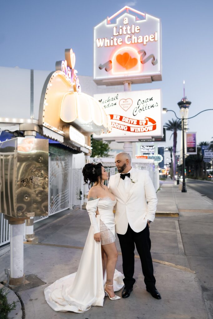 Bride and grooms Las Vegas elopement photos at The Little White Chapel at dawn