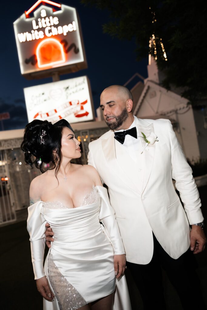 Bride and grooms editorial elopement photos at The Little White Wedding Chapel in Las Vegas