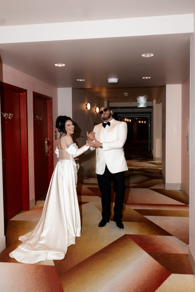 Bride and grooms flash elopement photos at Virgin Hotel in Las Vegas