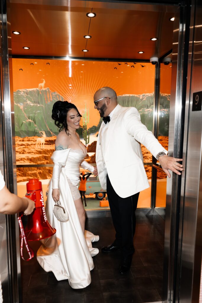 Bride and groom getting on the elevator at Virgin Hotel in Las Vegas