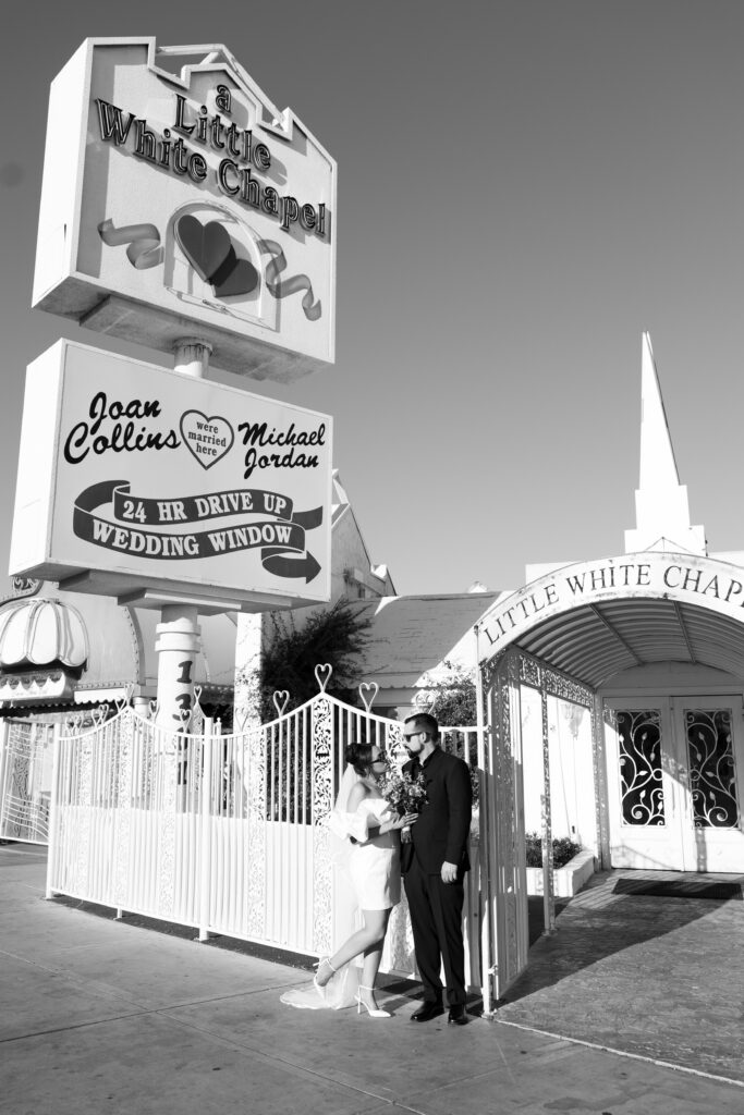 Black and white photo of a bride and groom at The Little White Chapel in Las Vegas