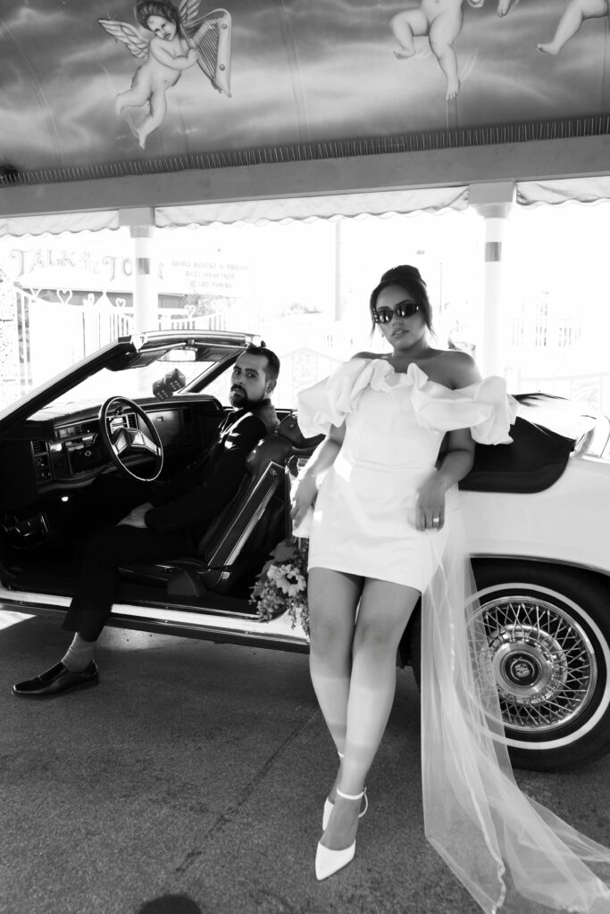 Bride and grooms intimate Little White Chapel elopement ceremony with a 1985 Cadillac El Dorado