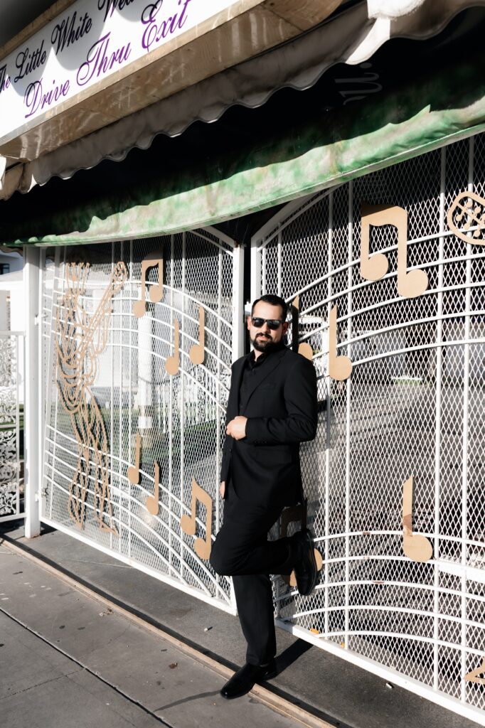 Outdoor grooms portraits at The Little White Wedding Chapel in Las Vegas