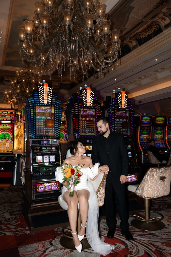 Bride and grooms flash casino portraits at The Venetian in Las Vegas