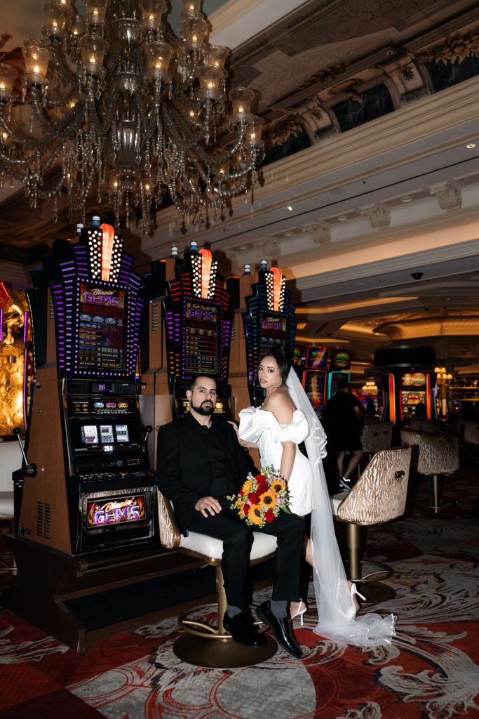 Bride and grooms flash casino portraits at The Venetian in Las Vegas