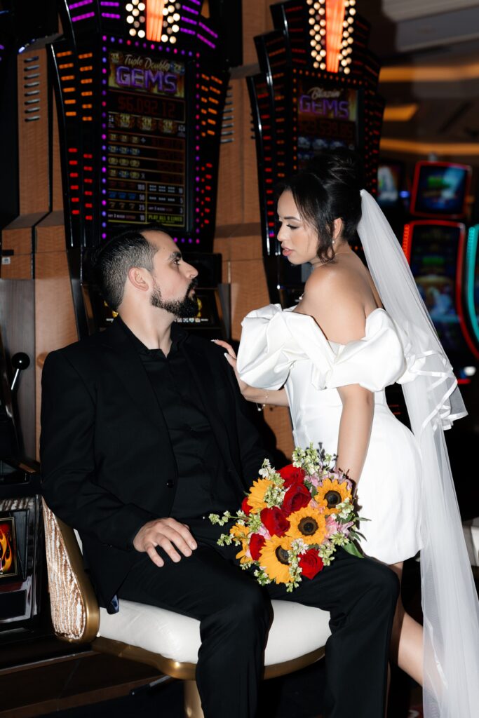 Bride and grooms flash casino portraits at The Venetian in Las Vegas