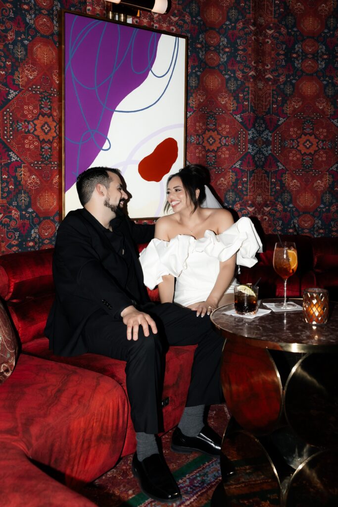 Bride and groom having cocktails at The Shag Room at Virgin Hotel in Las Vegas