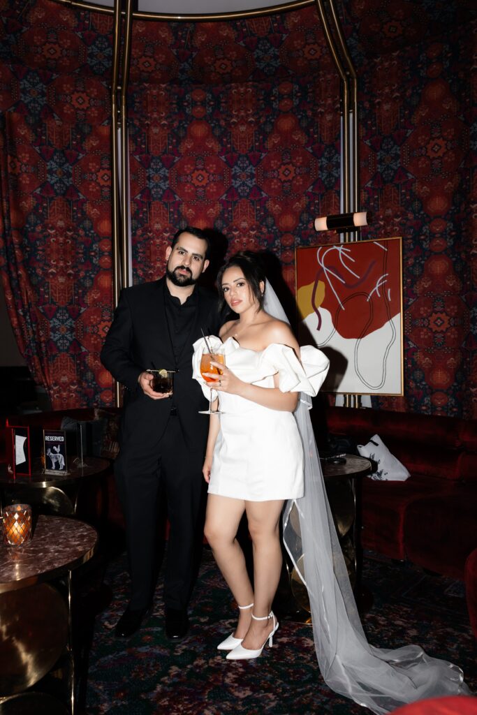 Bride and groom having cocktails at The Shag Room at Virgin Hotel in Las Vegas