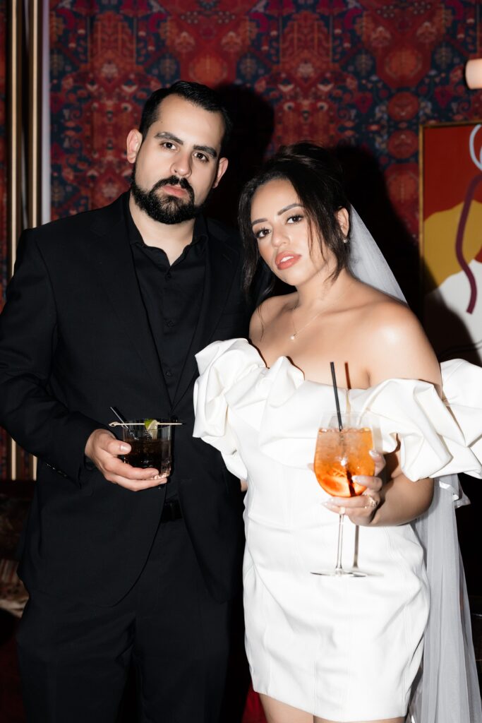 Bride and groom having cocktails at The Shag Room at Virgin Hotel in Las Vegas