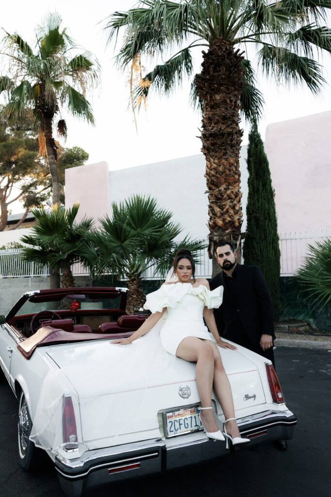 Bride and grooms Las Vegas elopement portraits with The Risky Ride - a 1985 Cadillac El Dorado