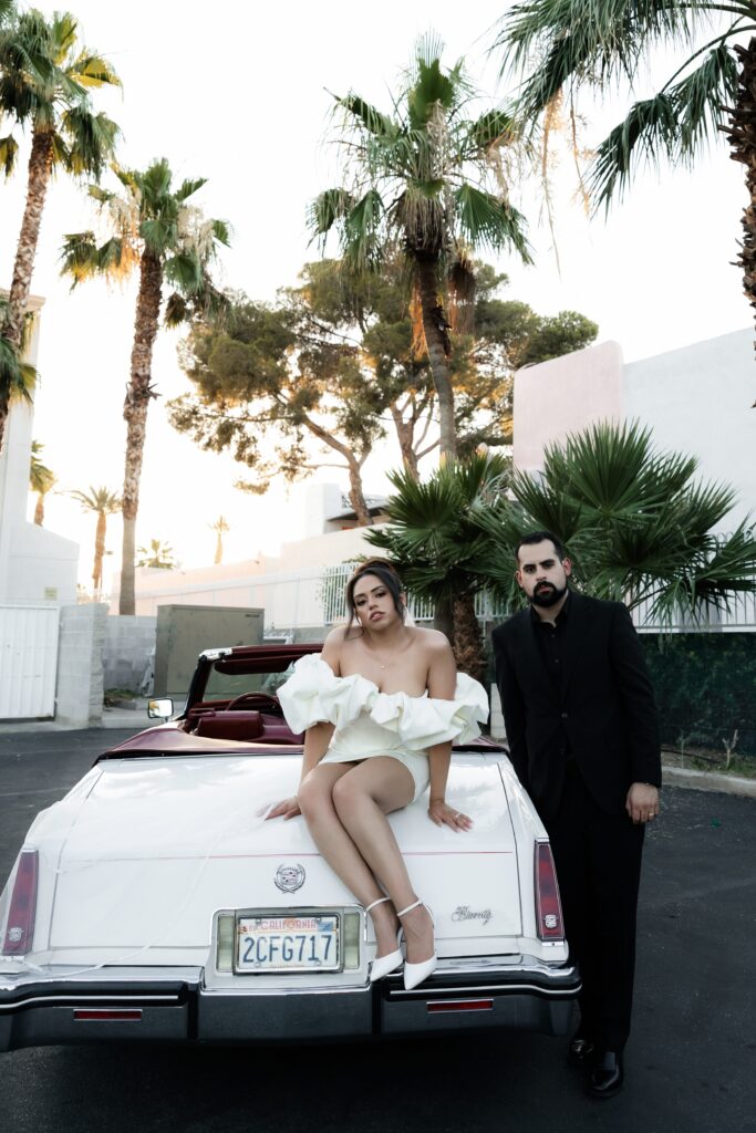 Bride and grooms Las Vegas elopement portraits with The Risky Ride - a 1985 Cadillac El Dorado