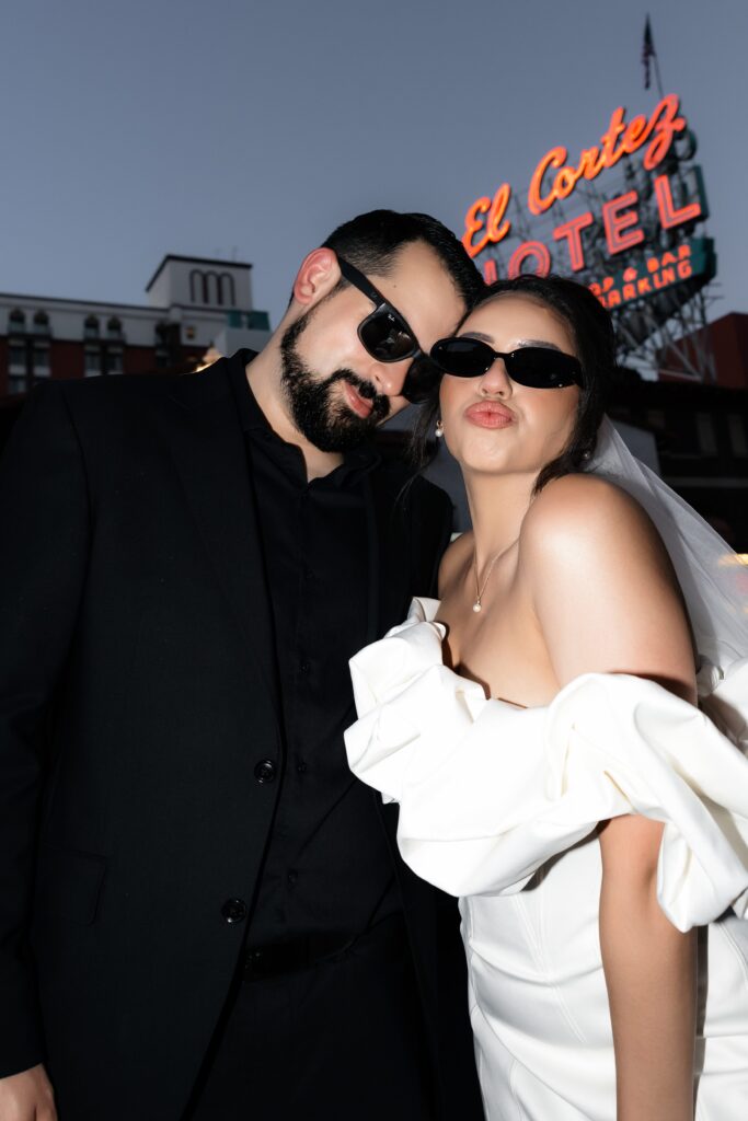 Bride and groom Las Vegas elopement photos in front of El Cortez Hotel