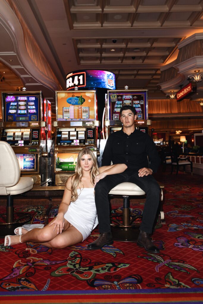 Bride and grooms Encore Las Vegas wedding portraits in the casino