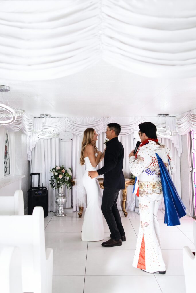 Elvis serenading a couple during their Little White Chapel elopement in Las Vegas