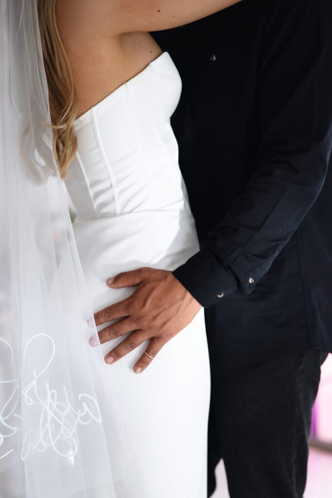 Close up shot of a bride and groom dancing