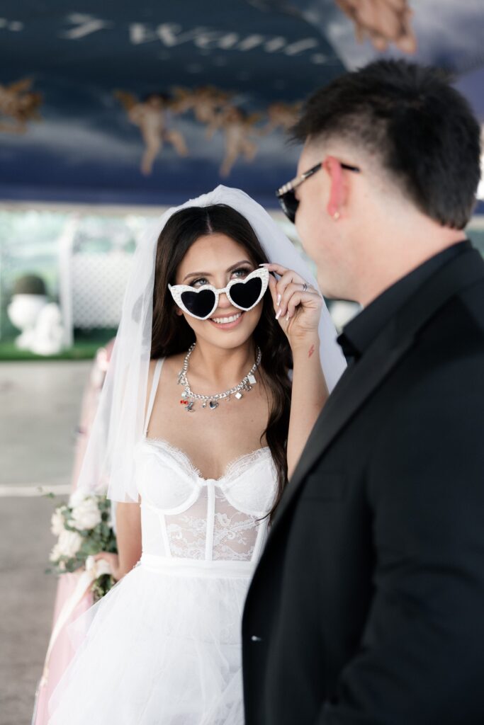 Bride and groom getting eloped in Las Vegas at The Little White Wedding Chapel