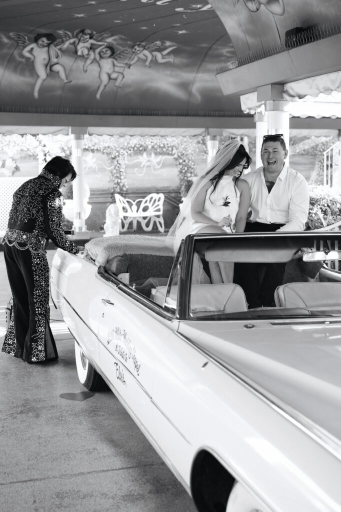 Bride and groom during their P[ink Cadillac Ceremony