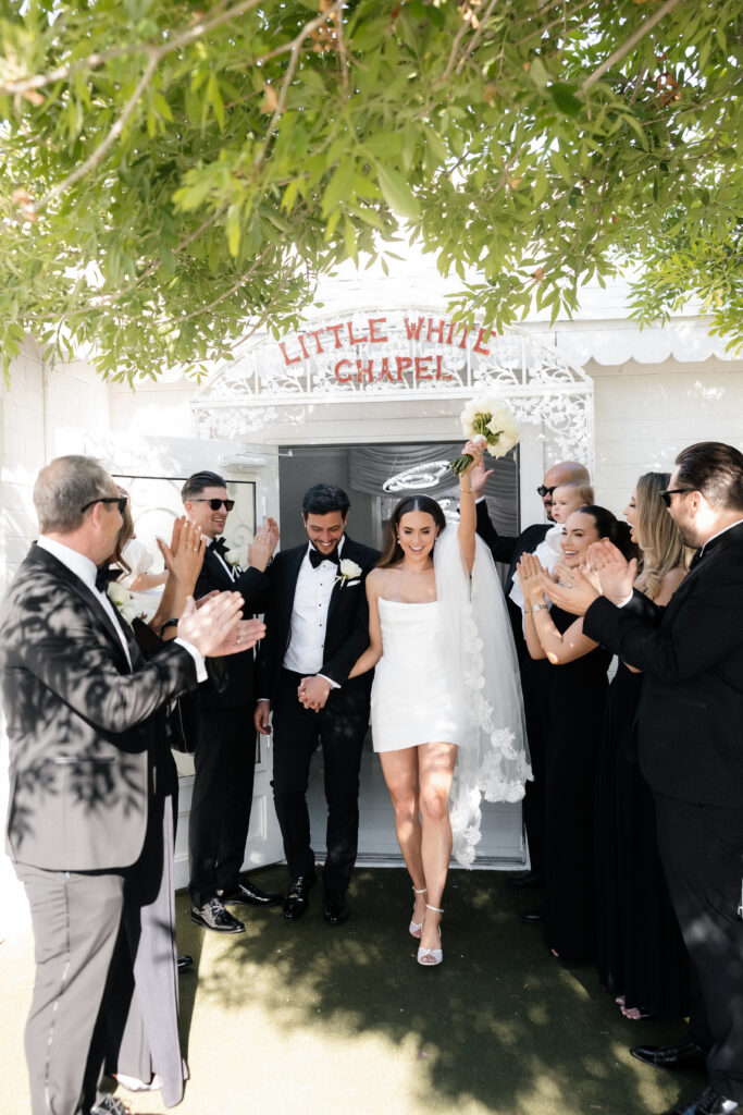 Bride and groom exiting their Little White Chapel wedding ceremony in Las Vegas.
