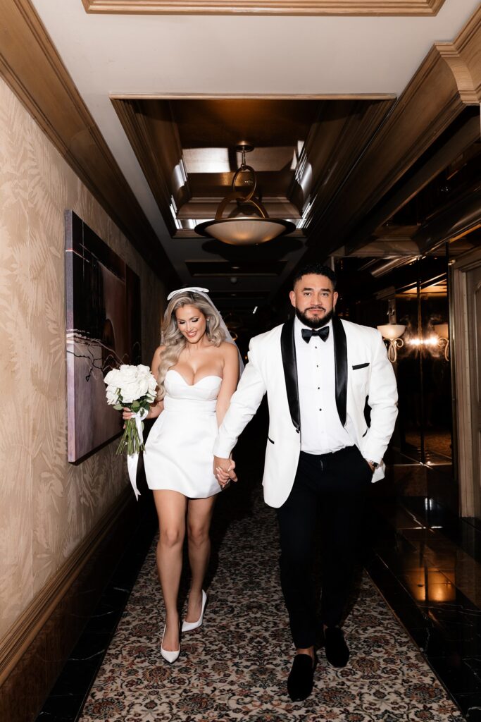 Bride and groom walking down the hallway at Golden Nugget in Las Vegas