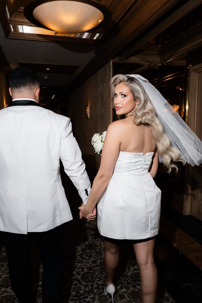 Bride and groom walking down the hallway at Golden Nugget in Las Vegas