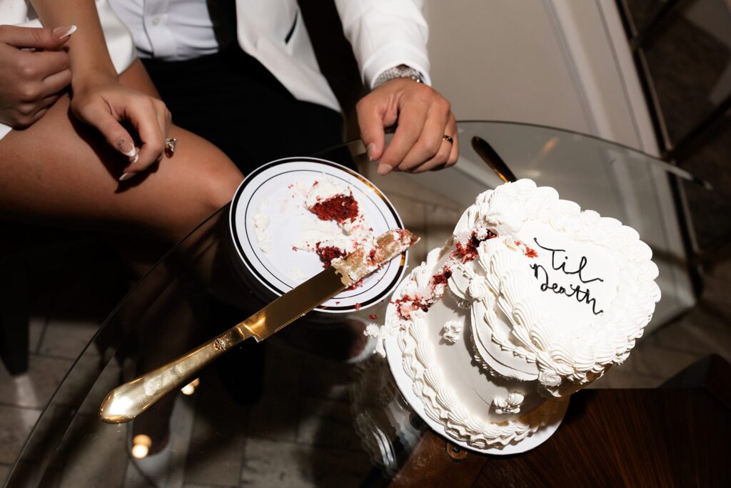 Photo of a heart shaped elopement cake that says till death