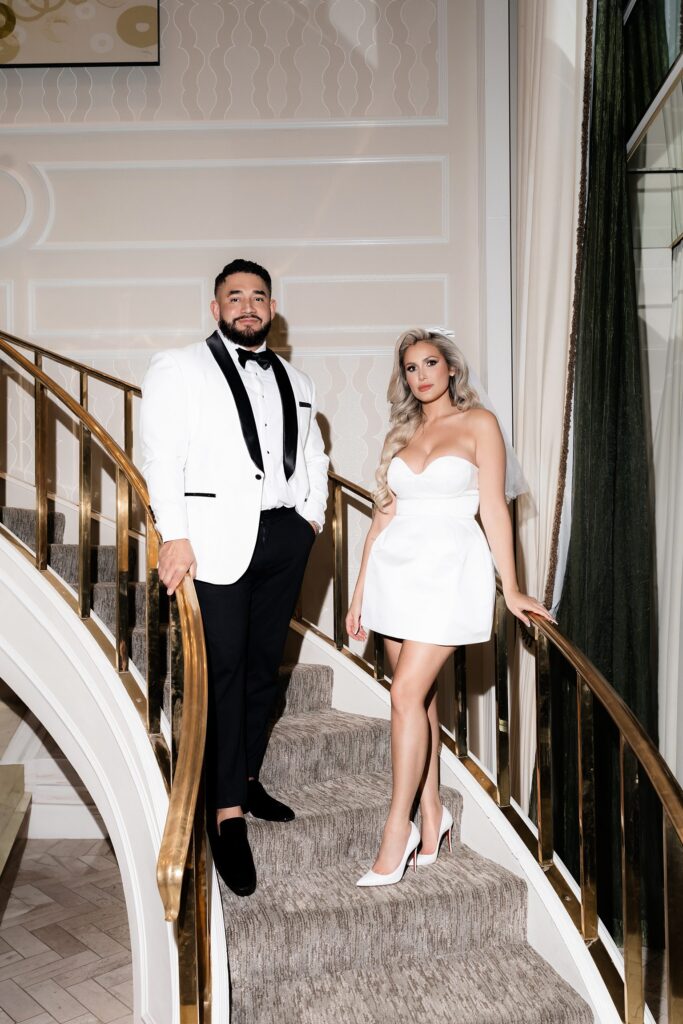 Bride and groom walking down the staircase at Golden Nugget in Las Vegas