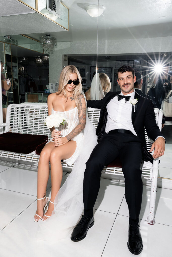 Bride and groom waiting in the lobby at The Little White Wedding Chapel in Las Vegas