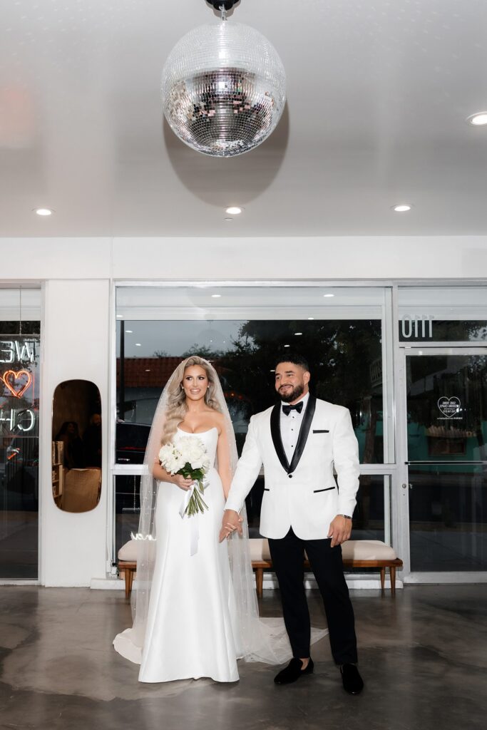 Bride and groom about to walk down the aisle for their Sure Thing Wedding Chapel elopement