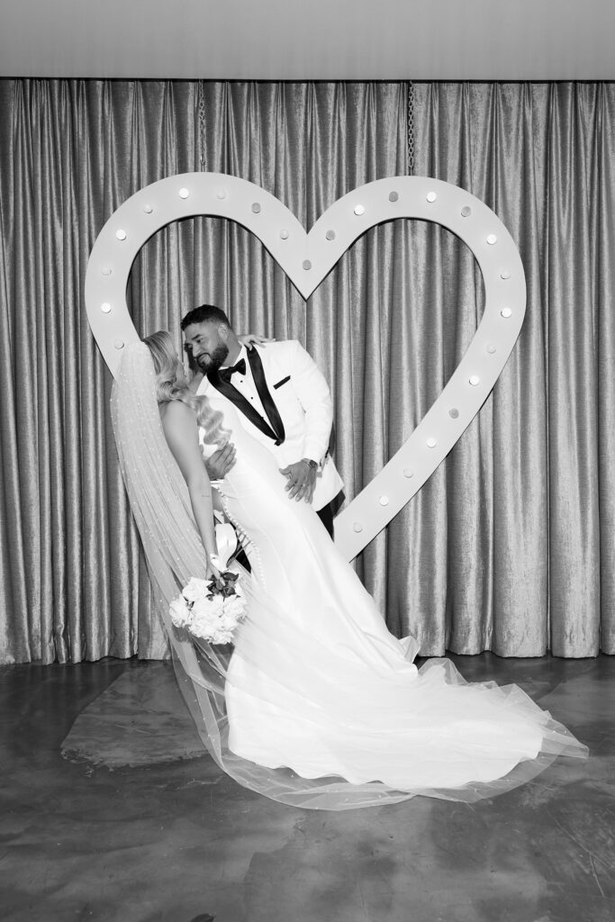 Black and white photo of a bride and groom at Sure Thing Wedding Chapel in Las Vegas