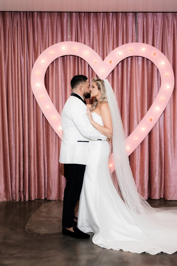 Bride and groom kissing during their Sure Thing Wedding Chapel elopement